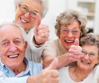 group-of-older-people-showing-thumbs-up